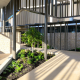 Harbour One Sanctuary Cove apartments installs Industralight iFlex LED under raised exterior pathways.