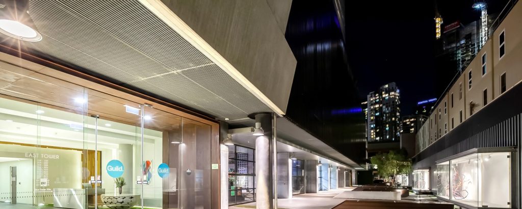 Industralight PHB200 LED highbays illuminating communal entry space
