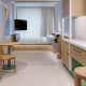 Lyf Bondi Junction Sydney hotel features custom Industralight striplighting.