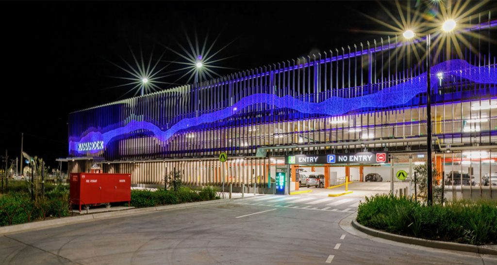 Industralight illuminating a sculptural installation on the facade of Kananook Car park at night